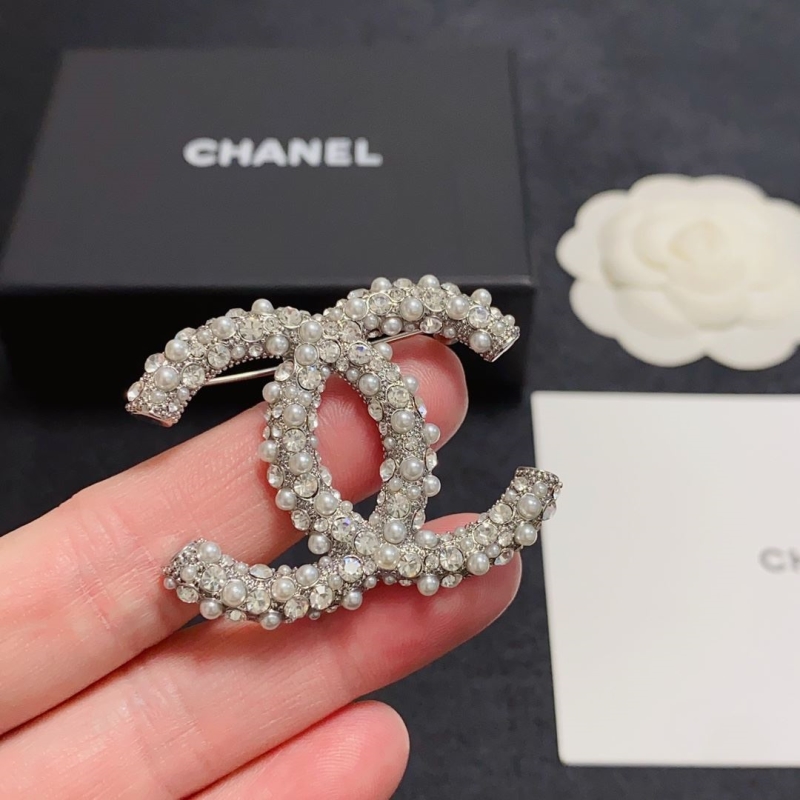 Ch**el brooches